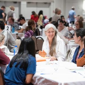 Photo of health mentor Cindy Frostad and students at program kickoff event