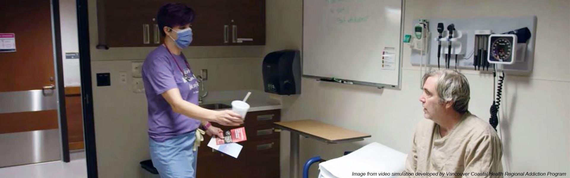 Photo of nurse handing cup of water to patient sitting on exam bed