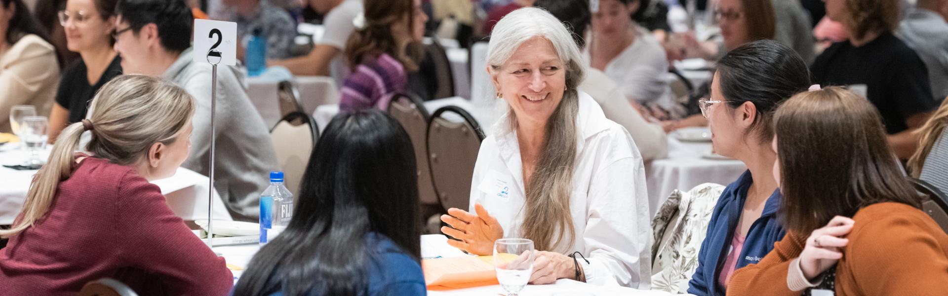 Photo of health mentor Cindy Frostad and students at program kickoff event