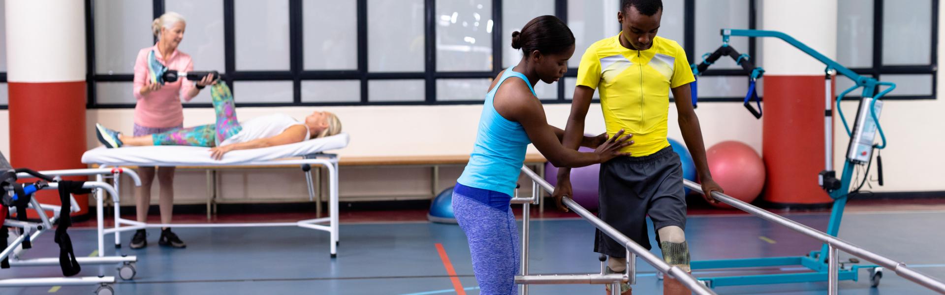 Photo of patients getting physical therapy treatment at clinic