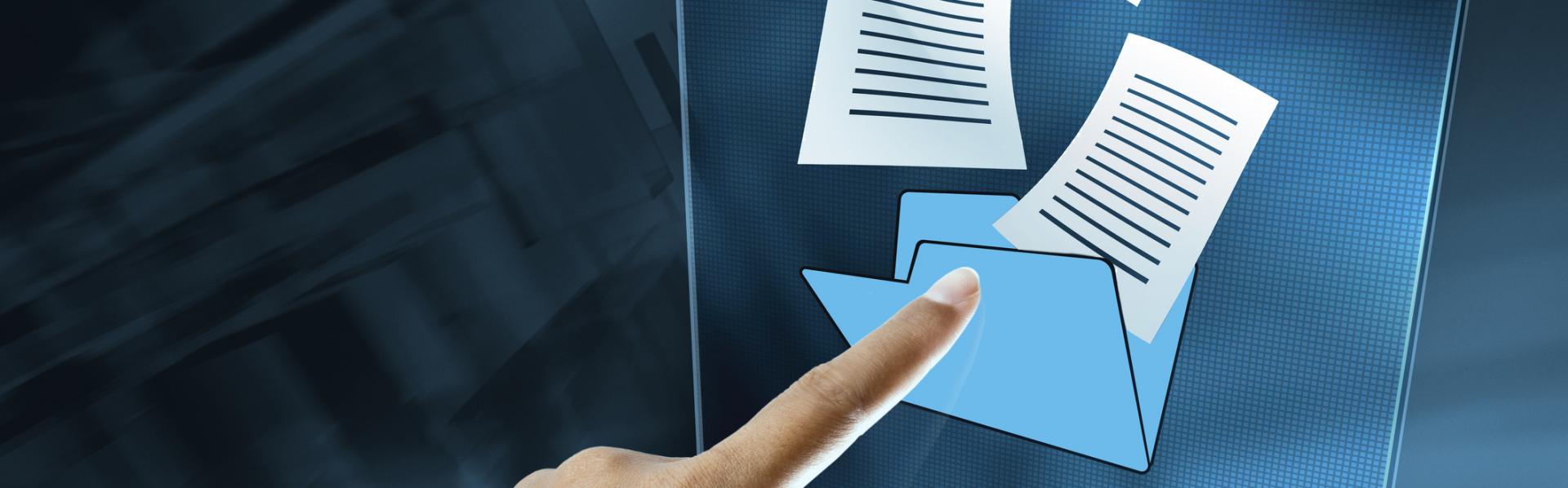 Photo of finger posting at documents coming out of a folder